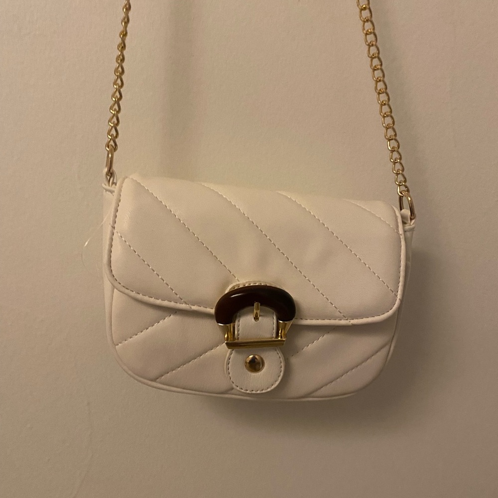 White crossbody bag with gold chain and clasp from NORDSTROM